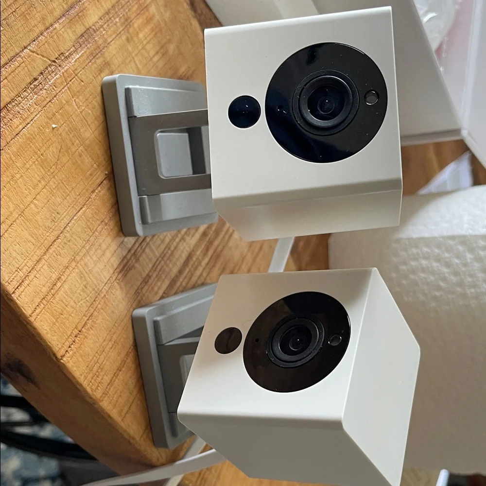 2 Wyze Indoor Wi‑Fi Cameras in White and Black